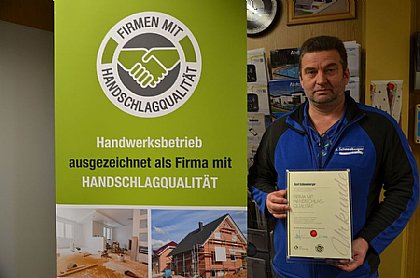 K.Schneeberger mit Handschlag-Qualität